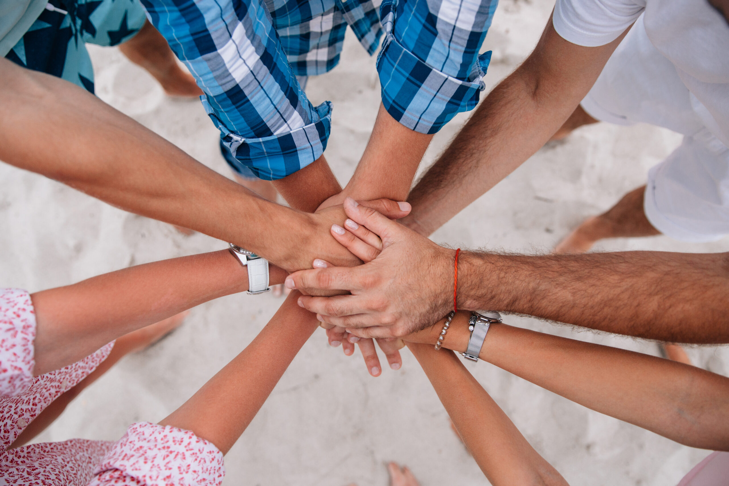 People joining hands together as a team