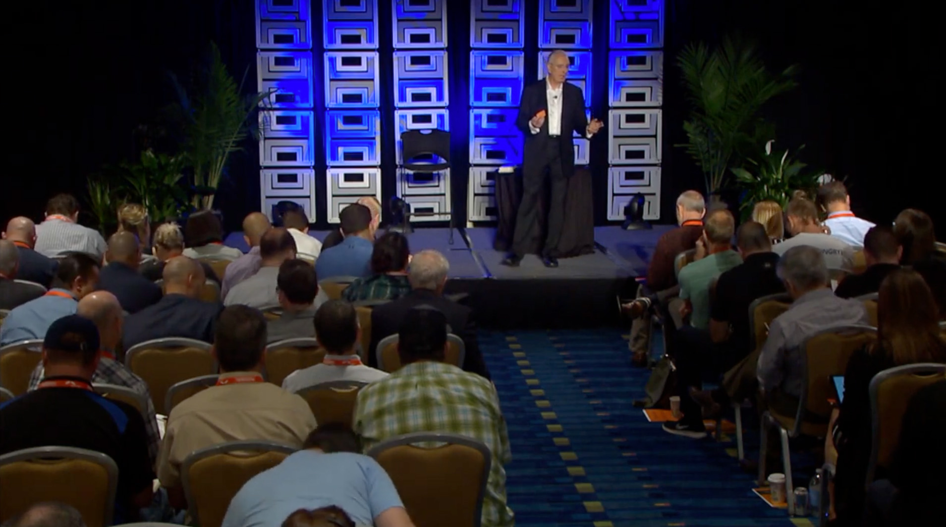 Boaz Power speaking to a live conference audience