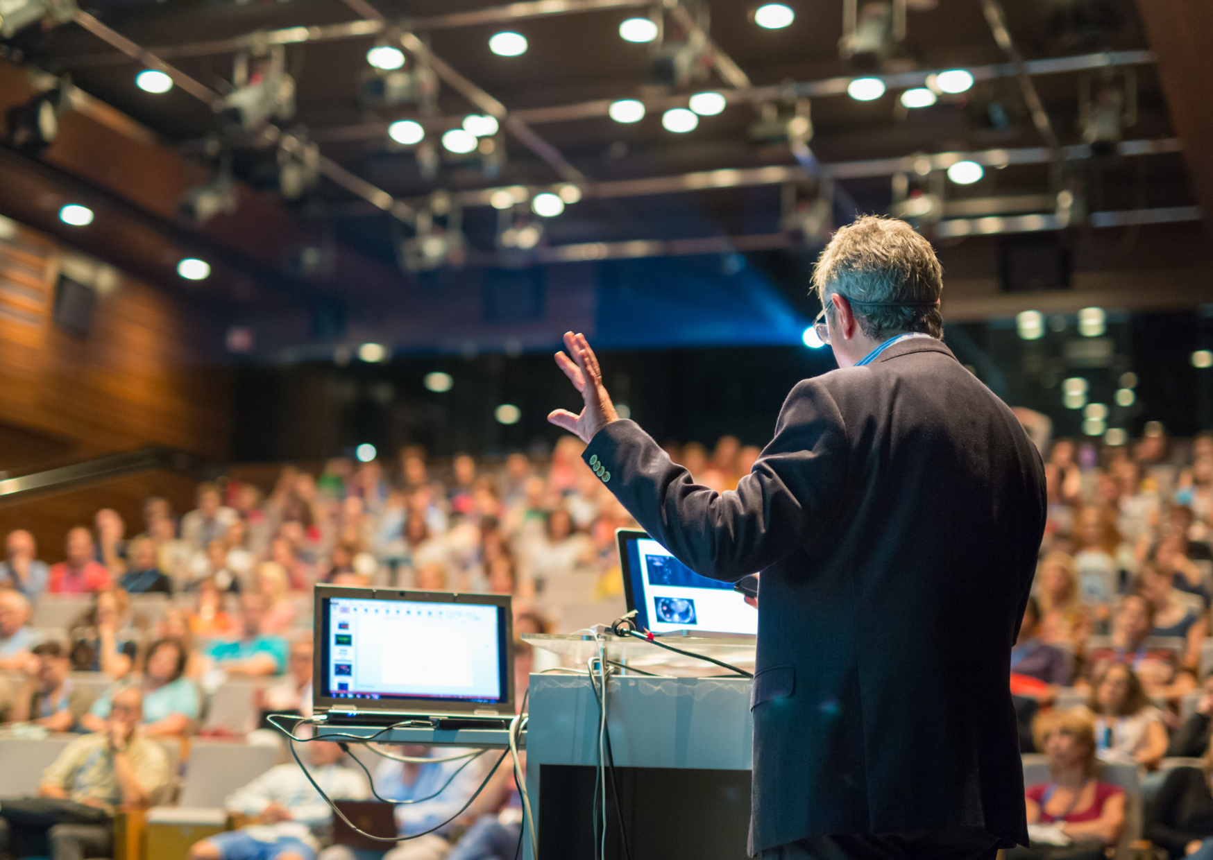 Corporate meeting audience for a leadership keynote